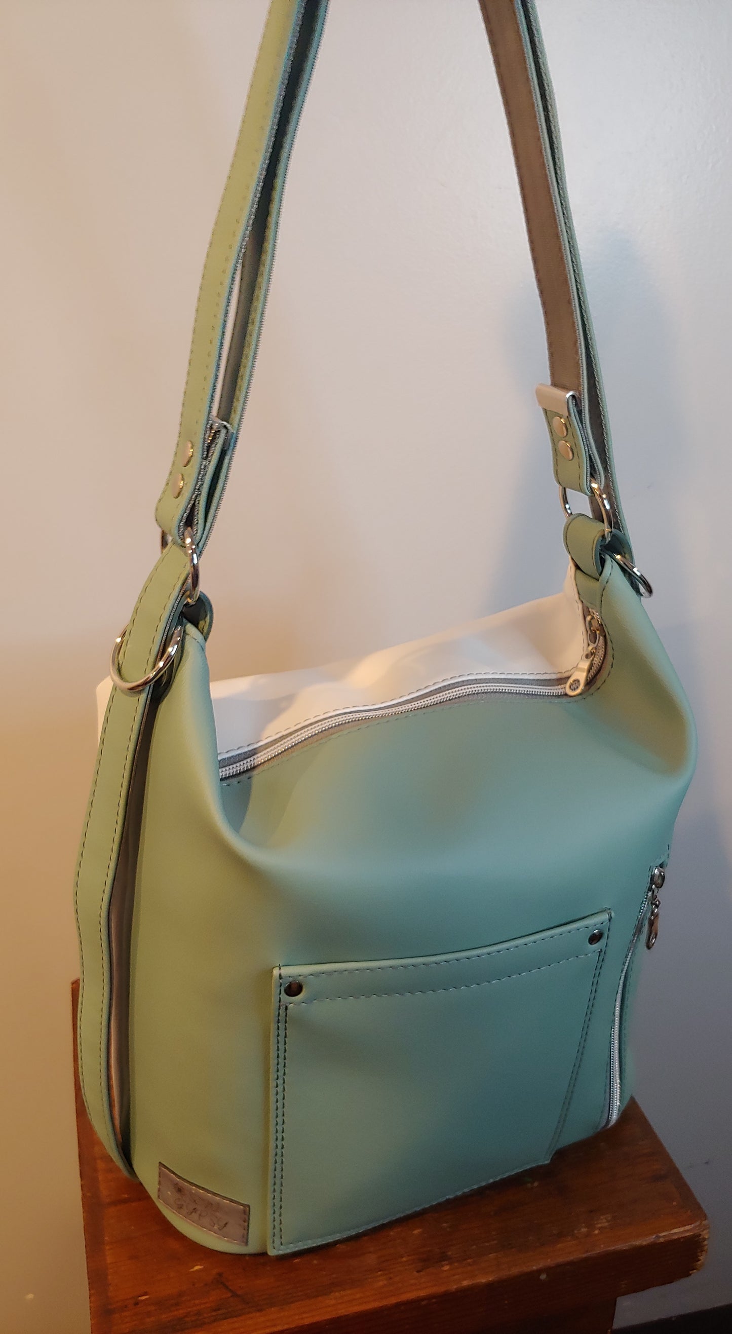 A Convertible Crossbody / Backpack